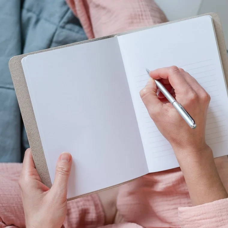 Journaling with a cup of tea, a quiet reflective moment
